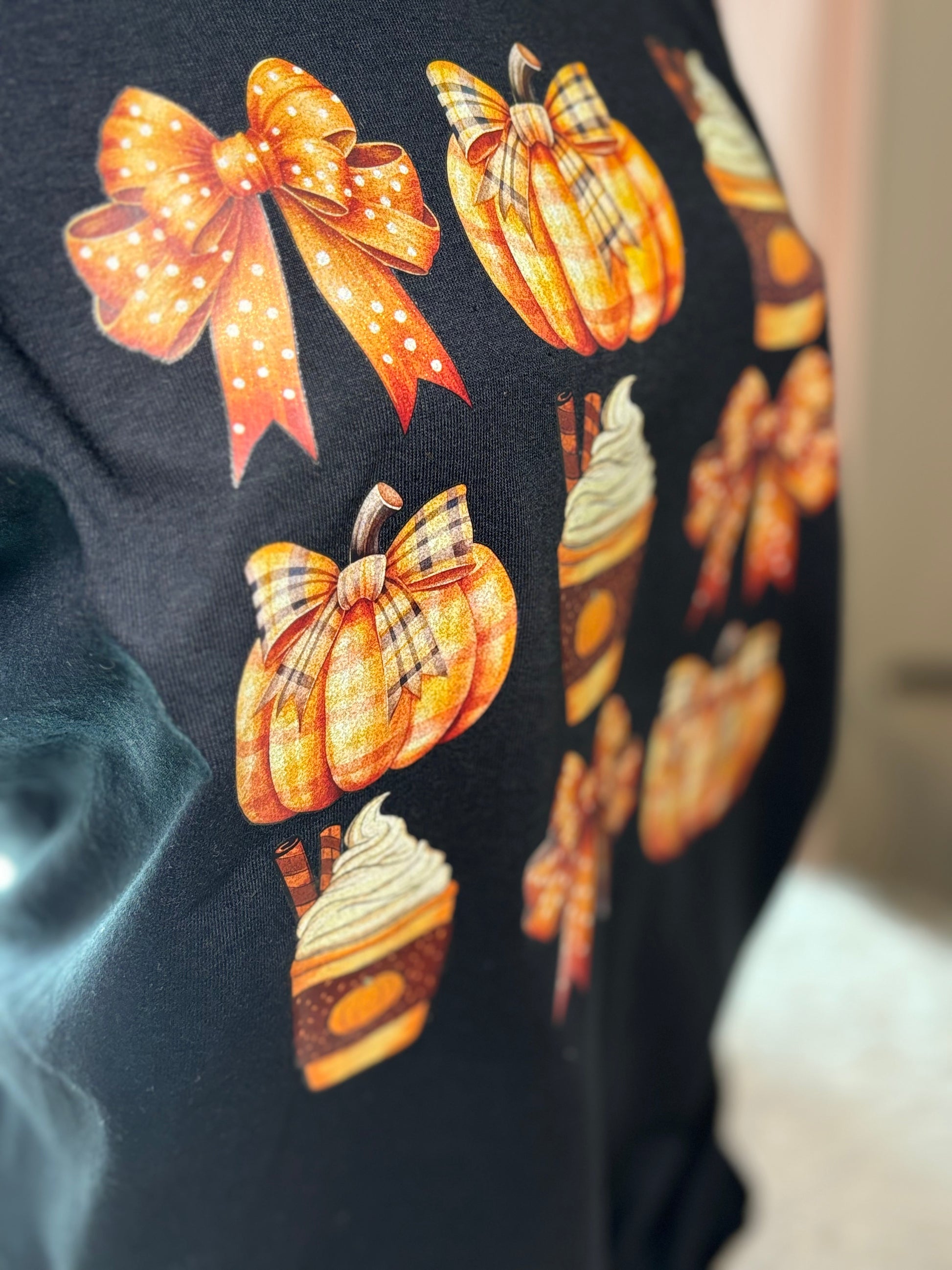 Black heat press t-shirt with glitter fall-themed graphics- Bows, pumpkin, latte