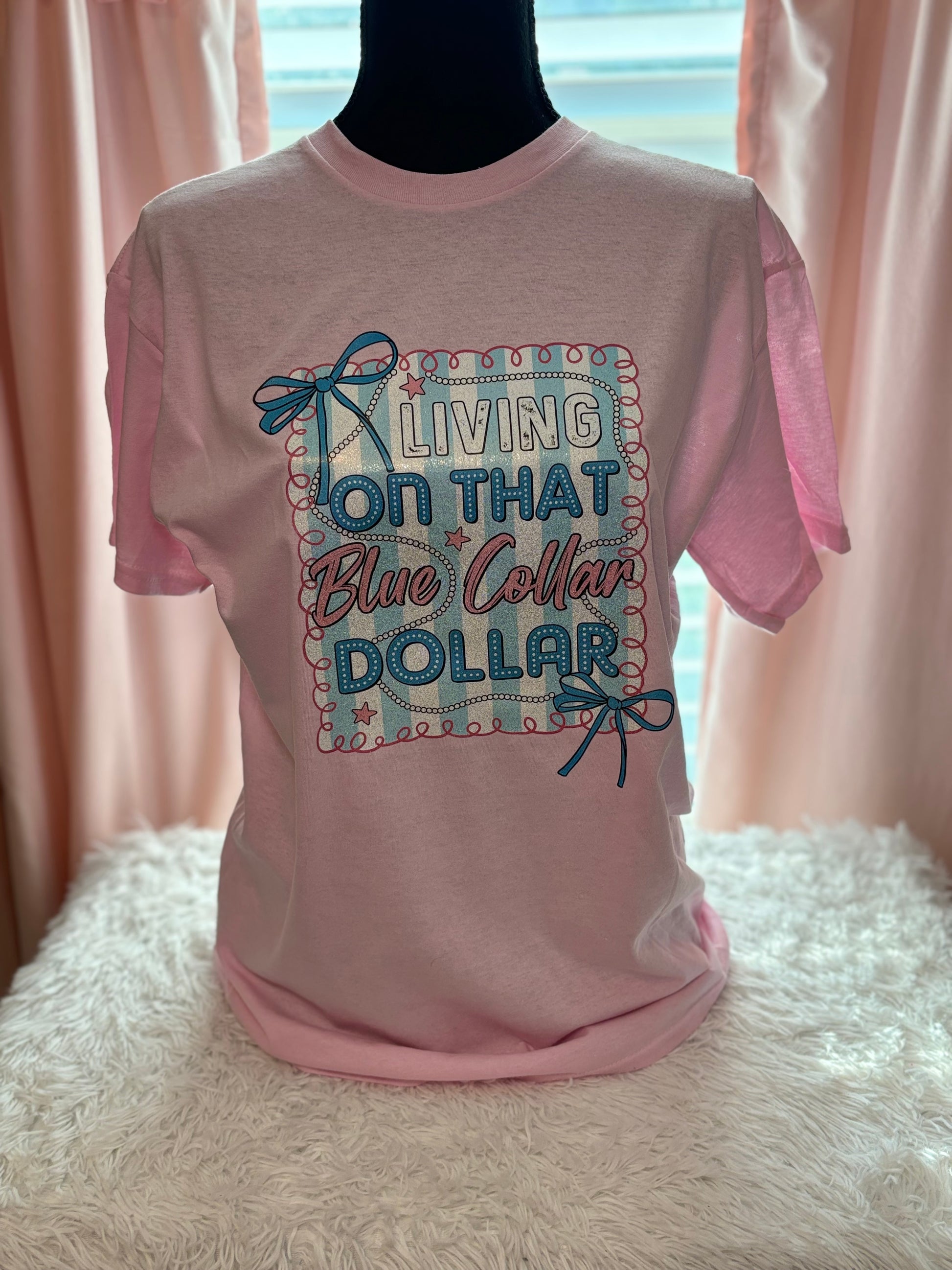 Pink heat press t-shirt with "Living on that Blue Collar Dollar" text and decorative elements