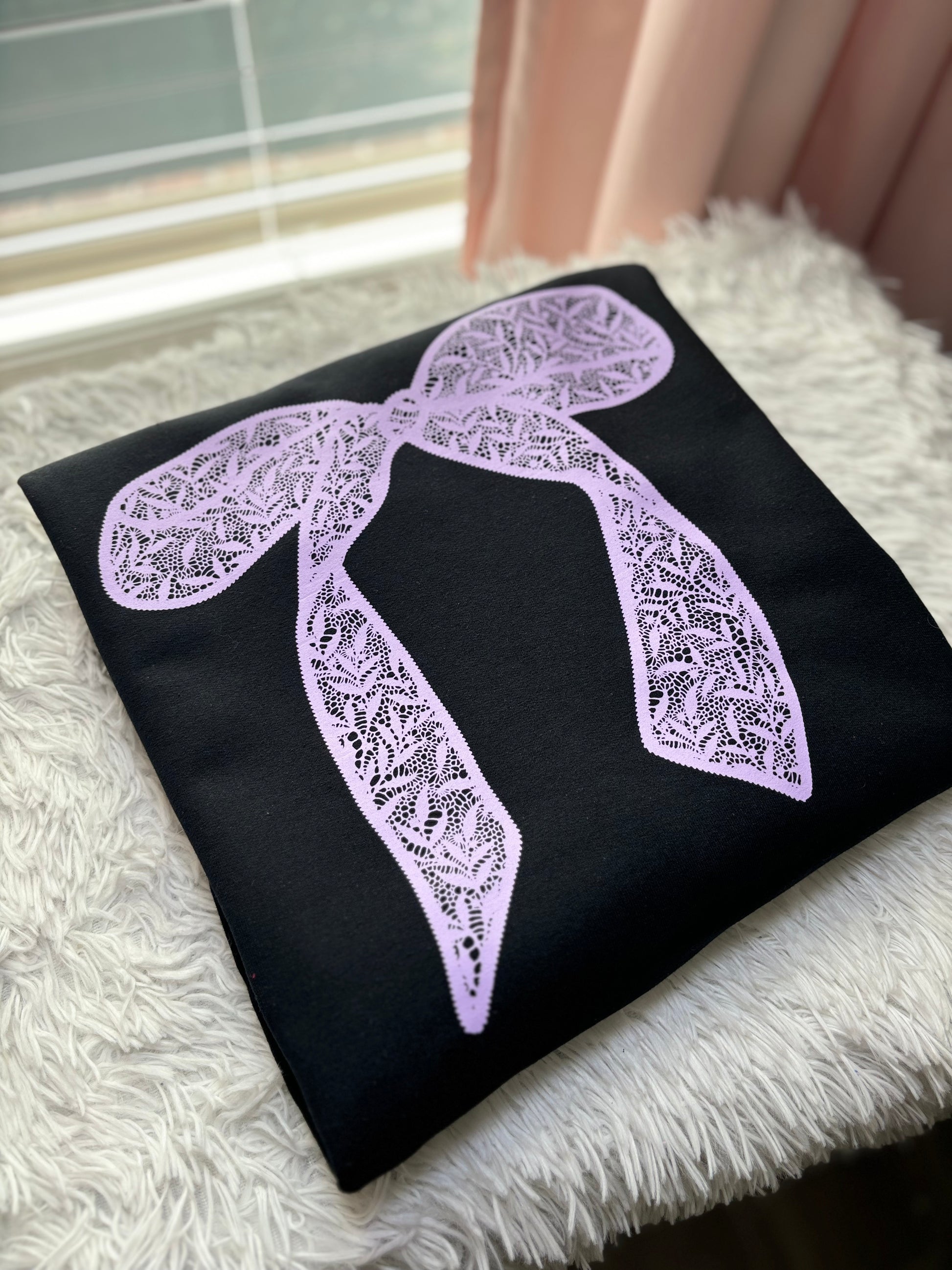 Black heat press sweatshirt with a purple lace bow design 