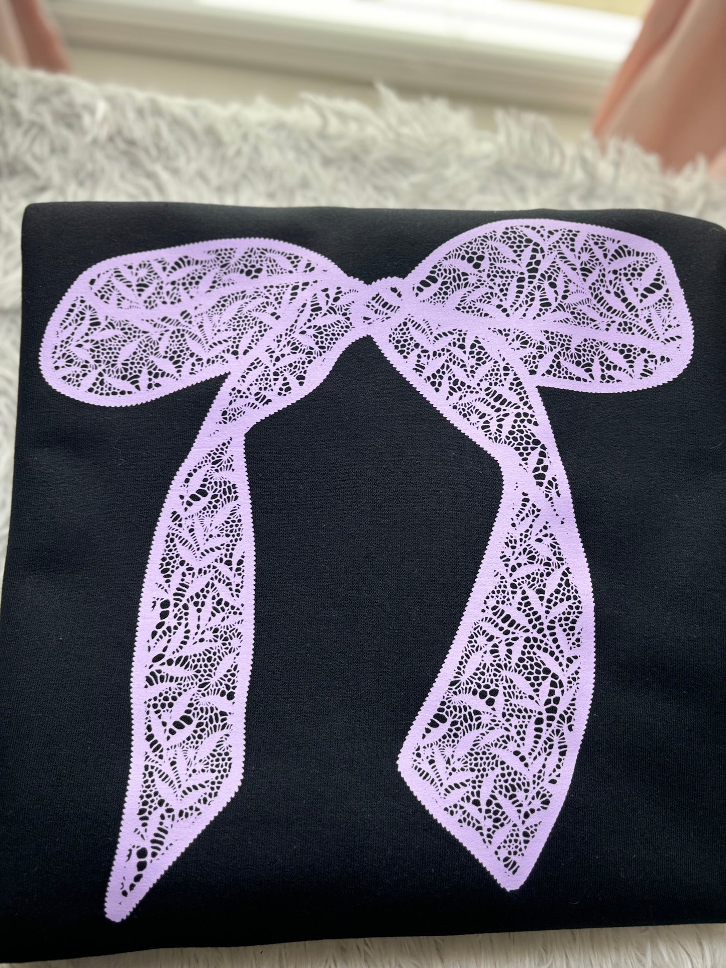 Black heat press sweatshirt with a purple lace bow design 