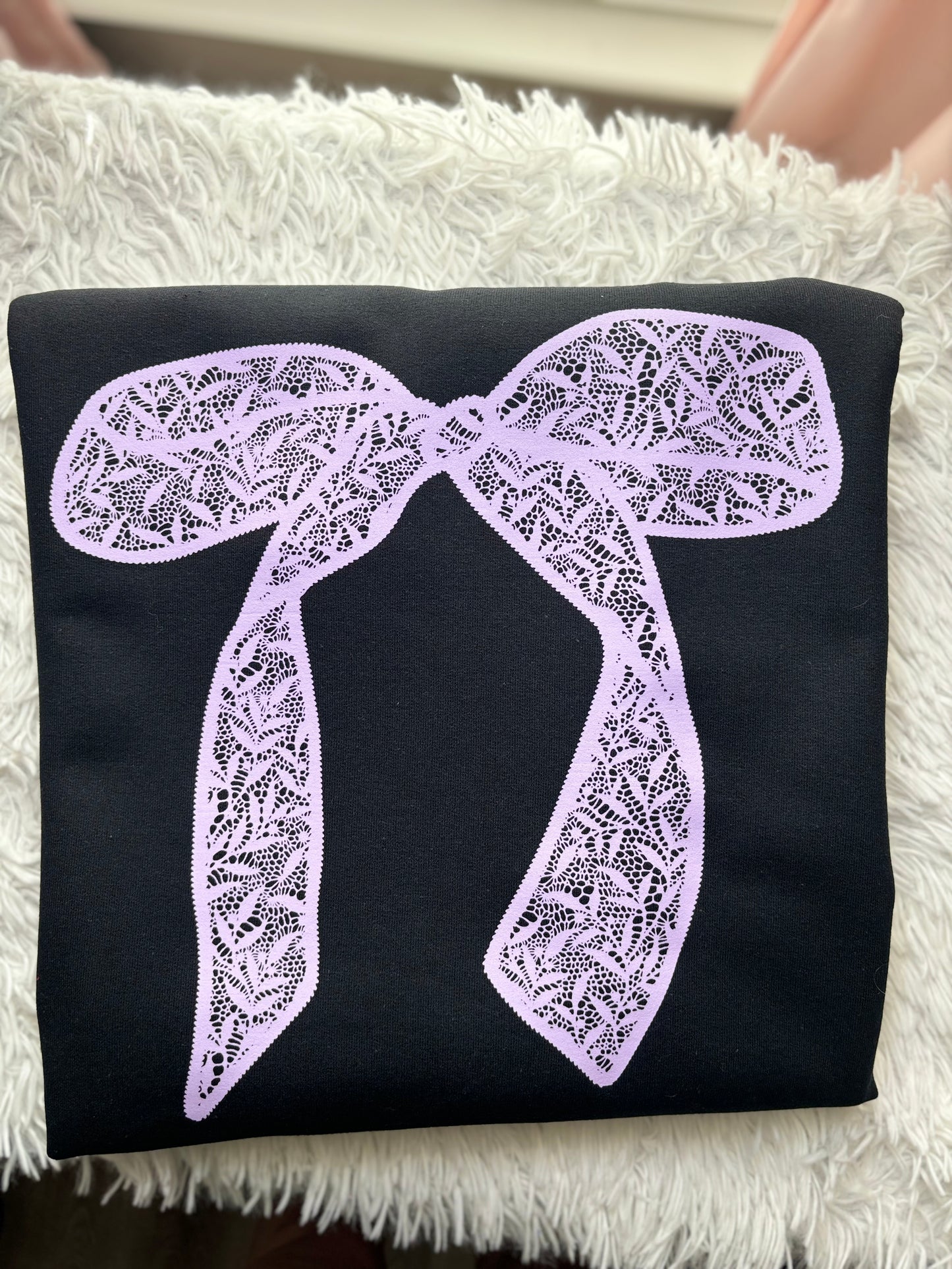 Black heat press sweatshirt with a purple lace bow design 