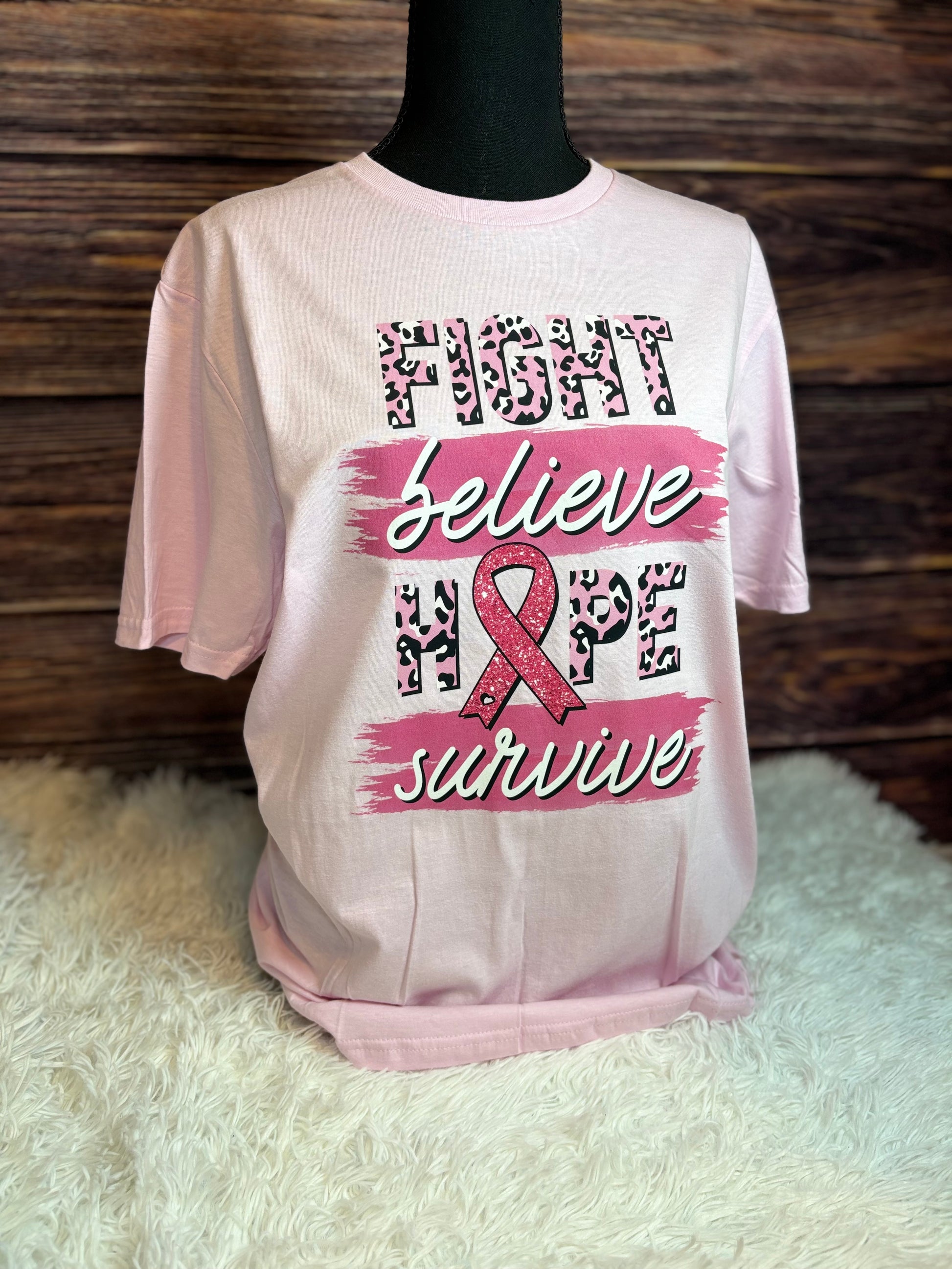 Light pink heat pressed t-shirt with "Fight, Believe, Hope, Survive." Breast Cancer Awareness t-shirt. Features leopard print