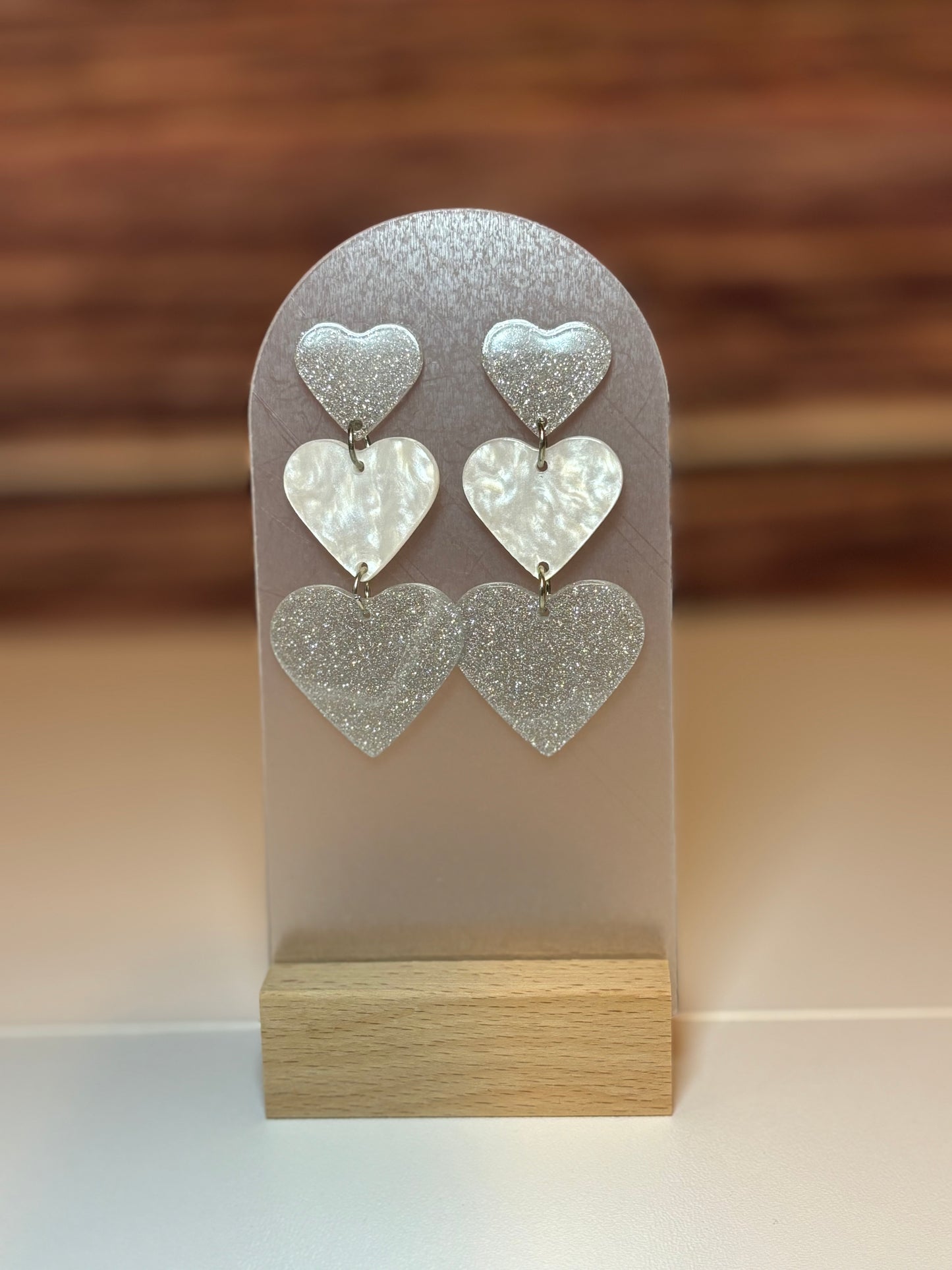 Triple Heart Acrylic Dangle Earrings – Silver Glitter & Pearl White