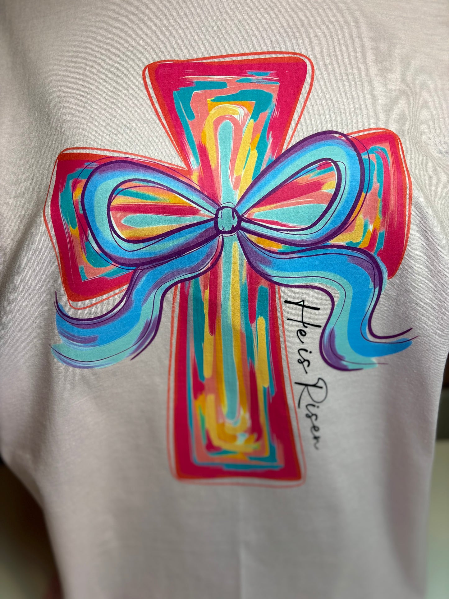 He Is Risen Colorful Cross Bow Graphic Tee – Christian Easter Faith T-Shirt